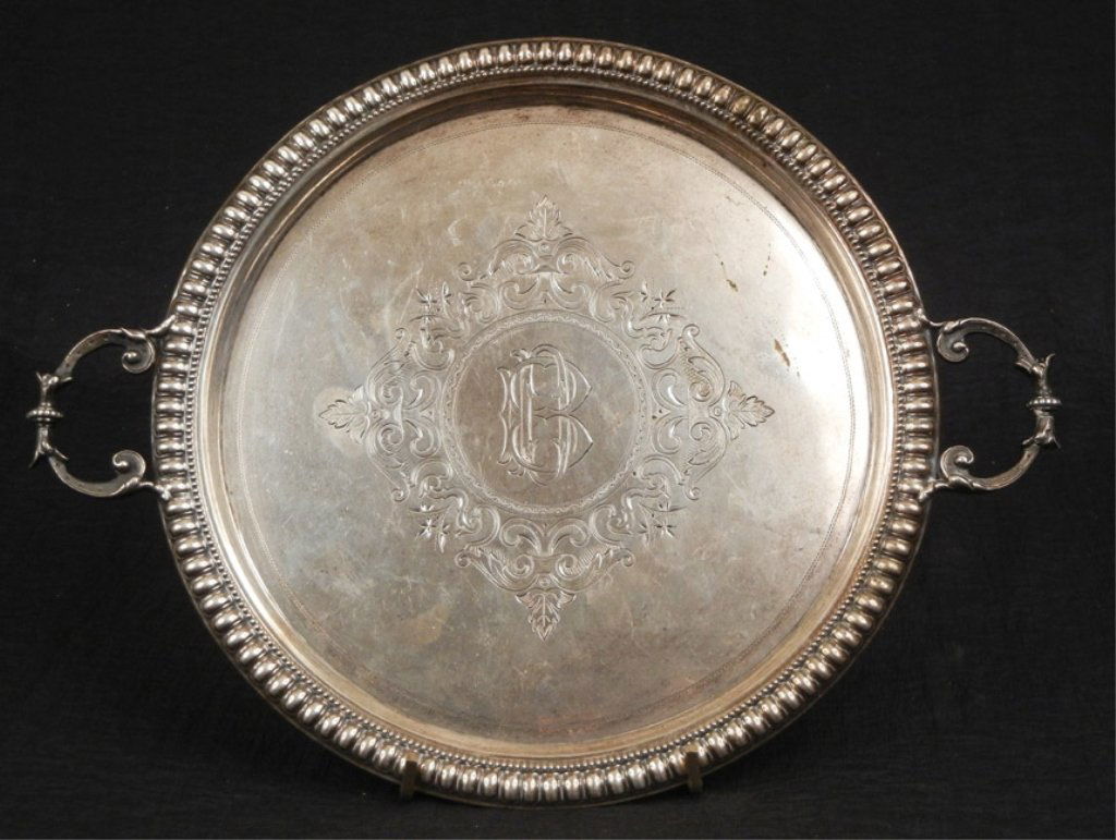 Richard Muller Russian 84 zolnick handled tray: Richard Muller Russian 84 zolnick handled tray, Riga 1887, engraved center design, monogrammed BD, hallmarks on back, 11" across, 10.58 troy ounces