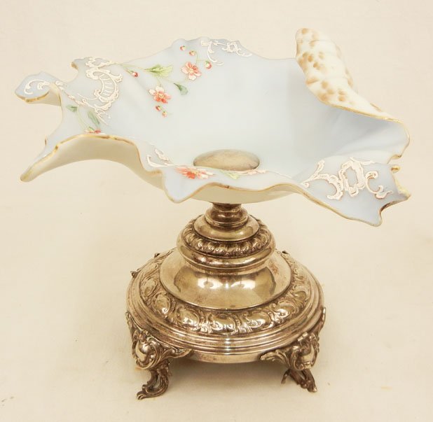 Enameled blue satin glass center compote with silver: Enameled blue satin glass center compote with silver plated base, ruffled edges, floral and foliate decoration, silver plated footed base, 9 3/4" high x 12 3/4" across