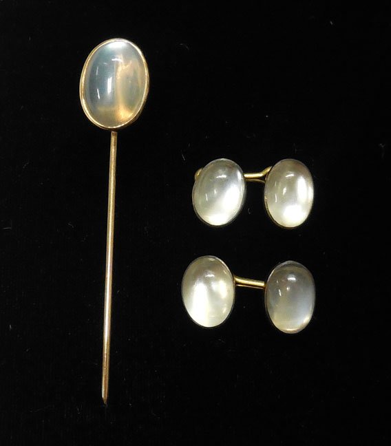 Gold moonstone stickpin and cuflinks: 14k gold moonstone stickpin and cufflinks, stickpin measures 2 1/2" long, marked 14k, cufflinks have stones on both sides and measure 12mm x 8mm, marked 14k, total weight 7.2 grams/4.6 dwt, early 20th
