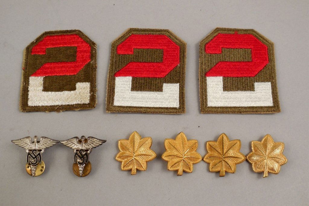 WWII U.S. Army insignias: WWII U.S. Army insignias, includes three 2nd Army shoulder patches, four rank Major oak leaf shoulder buttons, one is marked "Shoulder-Form, N.S. Meyer Inc. New York", and two Medical Service Corps pi