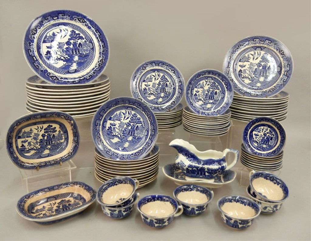 Buffalo Pottery Blue Willow dinnerware set: Buffalo Pottery Blue Willow dinnerware set, 79 pieces total, including twelve dinner plates, 10 1/2", twelve salad plates, 9 1/8", eleven dessert plates, 7 3/8", twelve cereal bowls, 7 3/4", nine frui