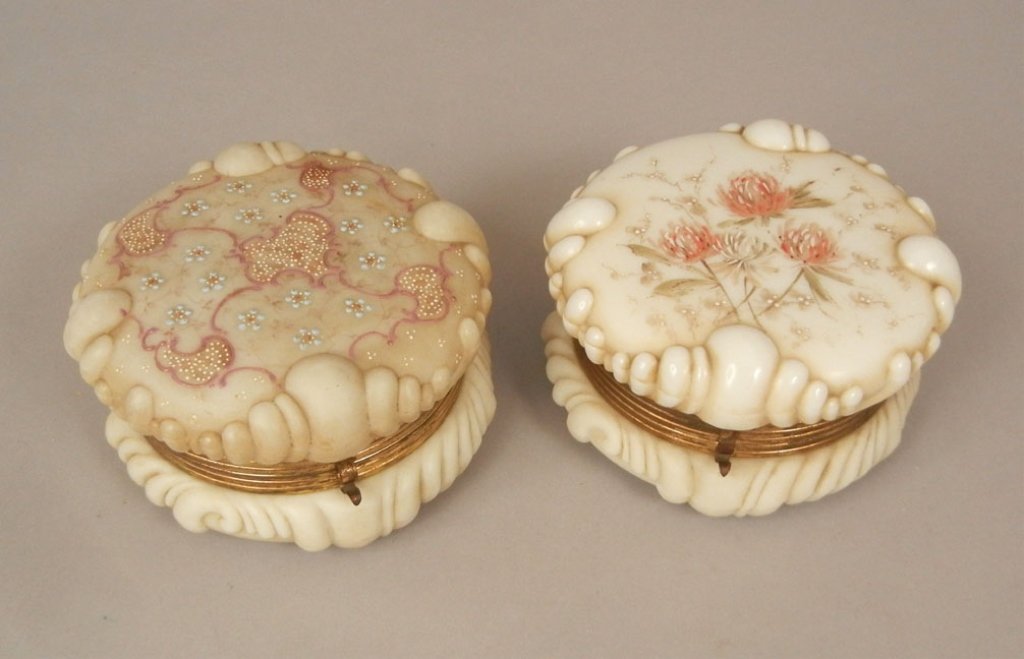 Two Wave Crest dresser boxes: Two Wave Crest dresser boxes, one is hand painted floral and swirl design on top, hinged lid, silk lined top interior, one is hand painted floral design on top, both are unmarked, both are 3 1/4" high