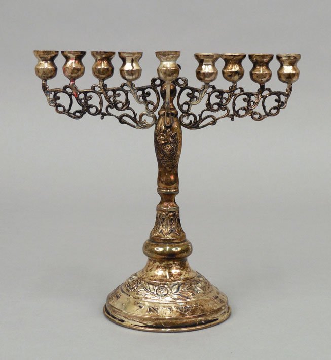 Sterling silver menorah: Sterling silver menorah, removable shamash, floral and scroll decoration, marked 925 S, 7 1/2" high x 7 1/4" across x 3 1/2" deep, 5.125 troy ounces