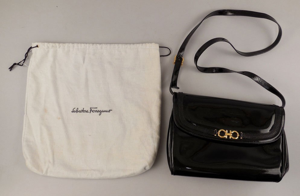 Vintage Ferragamo purse: Vintage Salvatore Ferragamo black patent leather purse with dust cover, 10" long x 7" high, shoulder strap with 17" drop, black lining, tag inside "Salvatore Ferragamo Made in Italy AN 21 3144", ca. 1