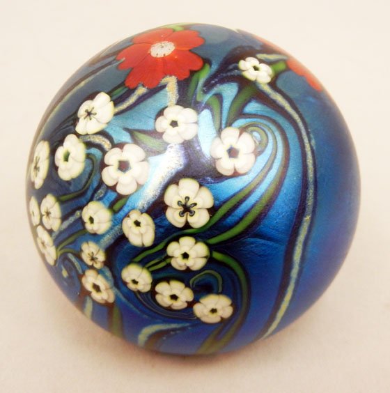 Orient and Flume iridescent art glass paperweight,: Orient and Flume iridescent art glass paperweight, floral design, signed on bottom \"Orient and Flume, 151 M 1983\", with label on bottom, 2 3/4\" high