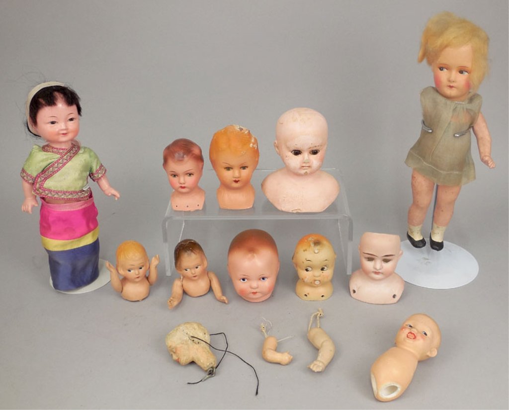 Grouping of composition doll heads: Grouping of composition doll heads, including two by Leobaby, two by Wilson Walkies, one marked Germany on back, two heads unmarked, one with brown glass stationary eyes, one is marked but unreadable,
