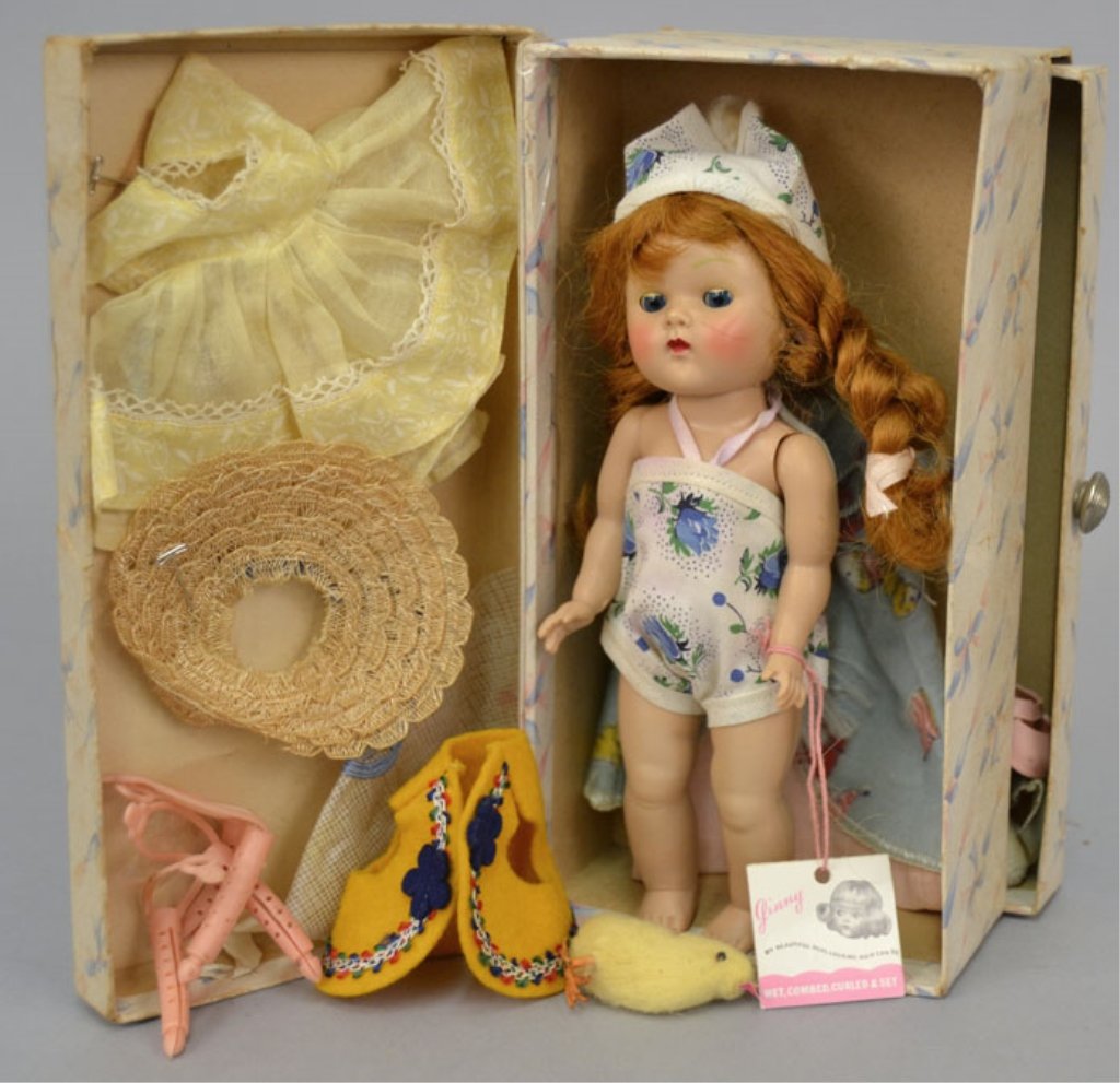 1952 Vogue strung Ginny trunk set: 1952 Vogue strung Ginny trunk set, with 7" hard plastic strung Ginny, with hang tag, additional outfits and accessories, trunk measures 8 3/8" x 4 1/2" x 3 3/8"