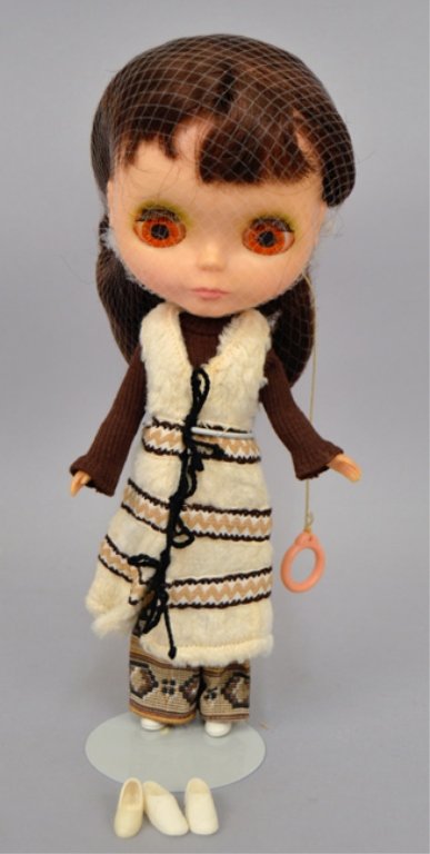 1972 Blythe Kenner doll in Aztec Arrival outfit: 1972 Blythe Kenner doll in Aztec Arrival outfit, hard plastic and vinyl, eyes change color when string is pulled, green eyeshadow, applied upper lashes, pink painted lips, marked on back, tagged outfi