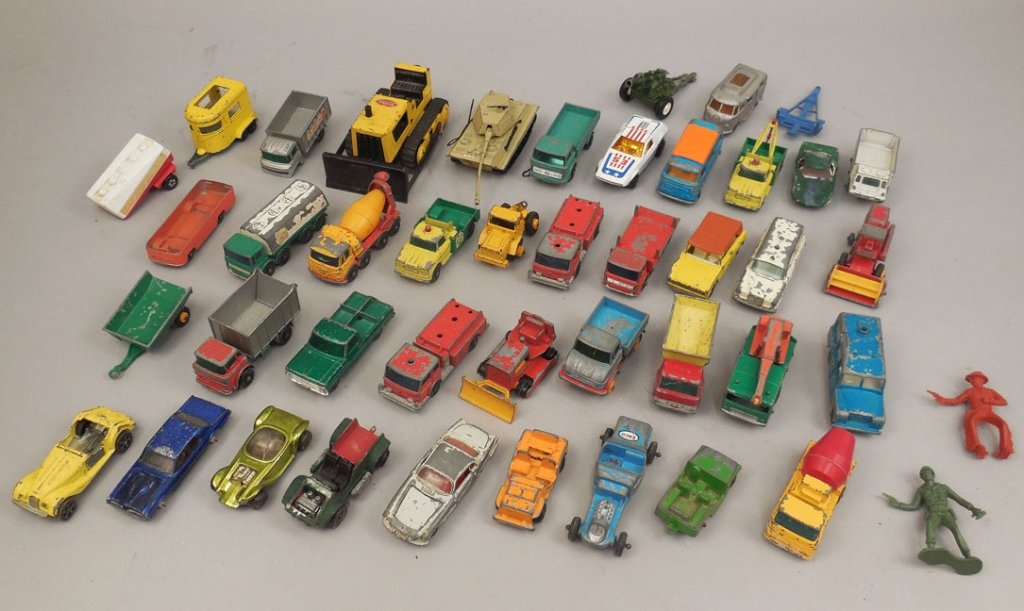 Grouping of 28 "Matchbox" by Lesney cars, and 14: Grouping of 29 "Matchbox" by Lesney cars, and 13 diecast cars, including from Lesney, Ergomatic Cab, 8 Wheel Crane, two Fire Pumper Trucks, Claas Combine Harvester, Mercedes Benz Binz Ambulence, and M