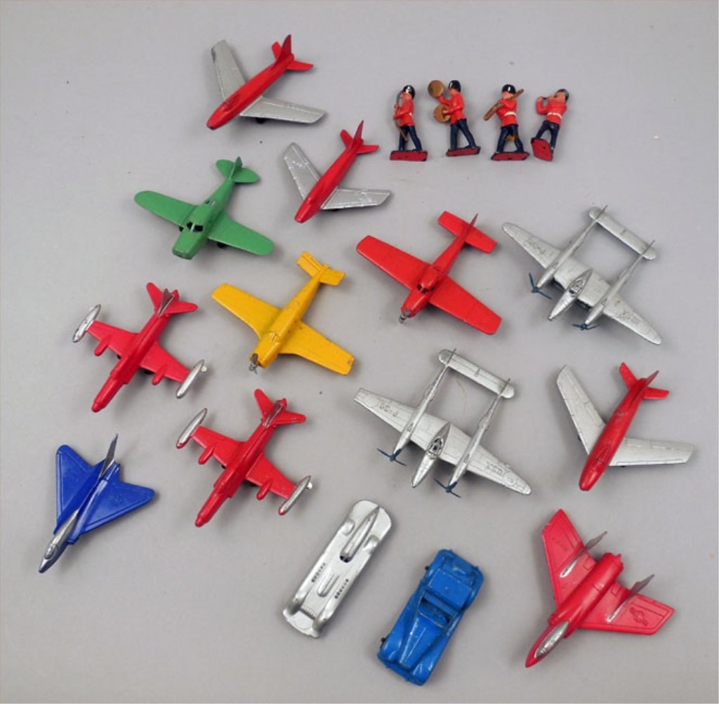 Twelve Tootsietoy airplanes: Twelve Tootsietoy airplanes, diecast airplanes, Tootsietoy car and Midgetoy car, four England soldiers playing instruments, airplanes include Beechcraft Bonanza, Star Fire, F-86 Sabre, F40 Sky Ray, F7
