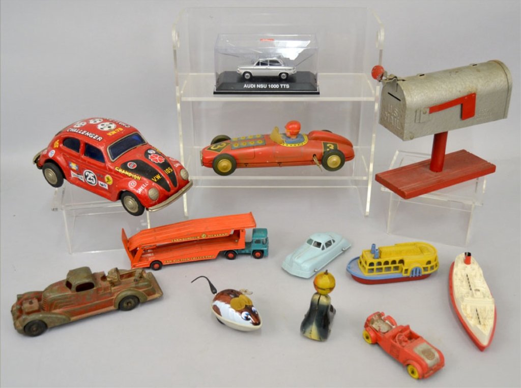 Grouping of tin litho wind up toys and cars: Grouping of tin litho wind up toys and cars, including Lotus type race car, Lehmann AHA 910 friction seal, wind up mouse Made in Hong Kong, "Matchbox" by Lesney Guy Warrior Tractor and Transporter, Hu