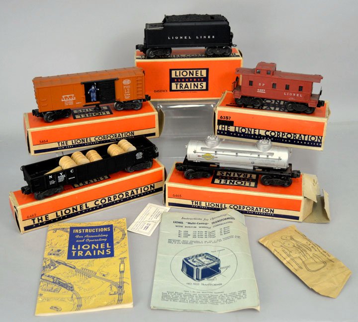 Lionel O gauge post war freight cars: Lionel O gauge post war freight cars, includes No. 6466WX tender, No. 3464 New York Central Box Car, No. 6462 Gondola car, No. 6465 Tank car, and No. 6357 Caboose, all in original boxes, with addition