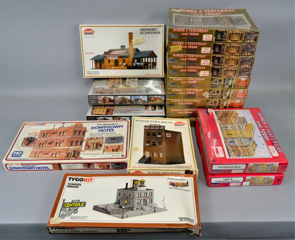 Grouping of HO scale model kits, new in boxes: Grouping of HO scale model kits, new in boxes, including Homes of Yesterday and Today building # 100 1-5 and # 100 19-22, nine total, Homes of Yesterday and Today building kits #25 and #26, Revell Hou