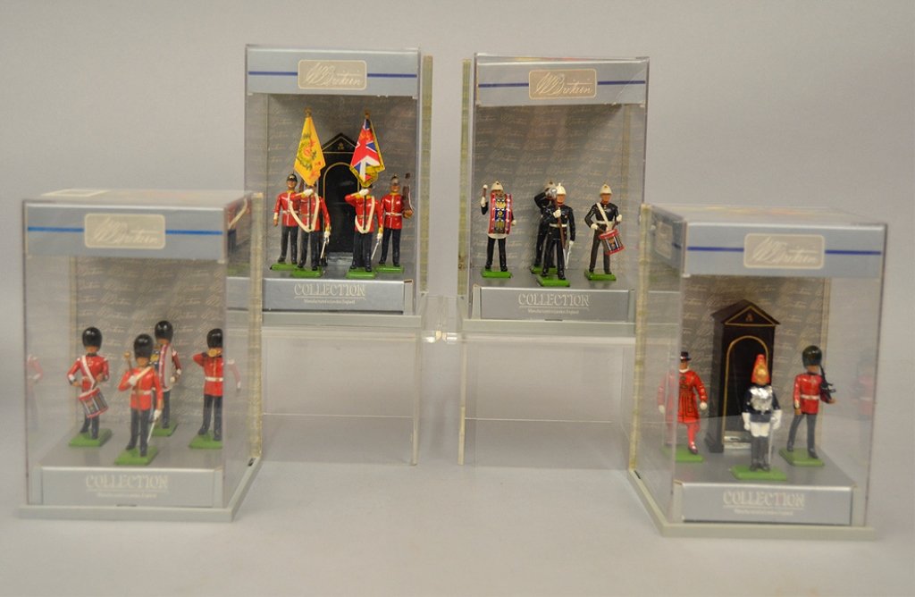 Four W. Britain Collection sets in cases: Four W. Britain Collection sets in cases, includes The Scot's Guards 4 piece set, The London Scene 4 piece set, The Middlesex Regiment 5 piece set, and the Royal Marines 4 piece set, hand painted deta