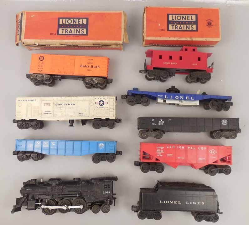 Lionel postwar O gauge train set,: Lionel postwar O gauge train set, includes No. 2018 steam locomotive and tender, No. 1004 box car in box, No. 1007 caboose in box, No. 6162 and No. 6462 gondolas, No. 6476 hopper, No. 3419 helicopter 