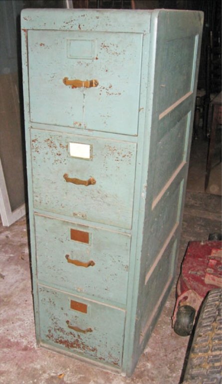 Pair of oak four drawer letter size file cabinets: Pair of oak four drawer letter size file cabinets, meant to be attached, one painted, paneled on one side and back of both, each measures 52" high x 15 1/2" x 26 1/2"
