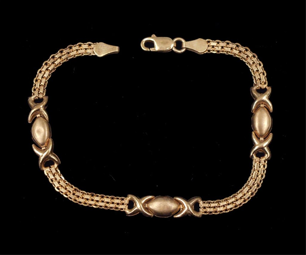 Gold Hugs & Kisses bracelet: 14k gold "Hugs & Kisses" bracelet, Copenhagen chain, 7" long x 1/4" wide, stamped 14k Italy, weight 4.8 grams/3.1 dwt, mid 20th C.