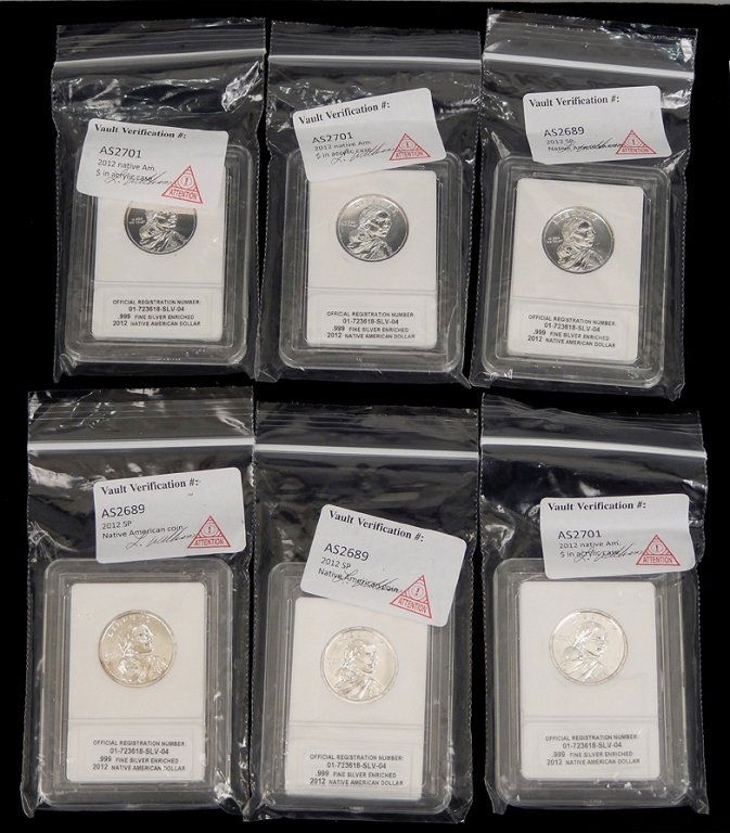 Six .999 fine silver enriched Native American dollars: Six .999 fine silver enriched 2012 Native American dollars, three with Vault Verification #AS2689 and three with #AS2701, all in acrylic cases