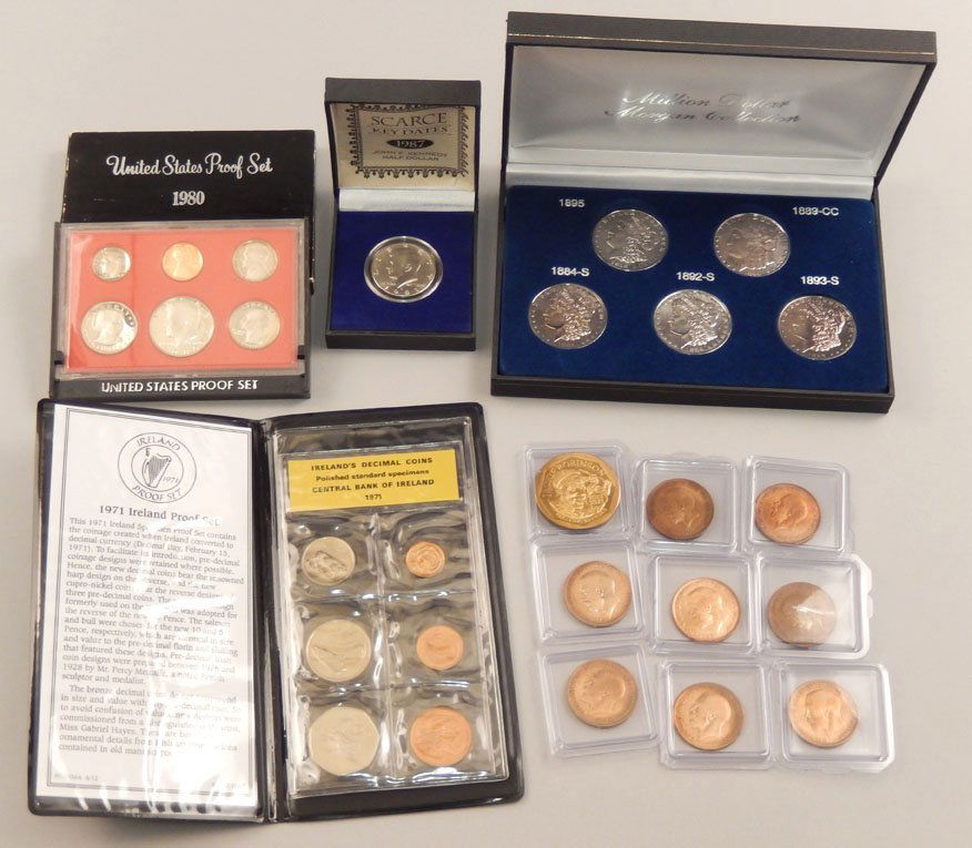 Grouping of coins: 8 early 20th English pennies, 1997 Commemorative Jackie Robinson Coin, 1971 Ireland Proof Set, Million Dollar Morgan Collection in fitted box, 1987 J.F. Kennedy Half Dollar, 1980 US Proof Set