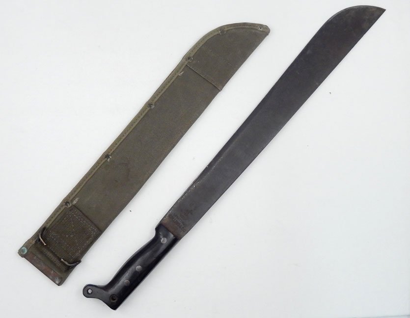 US WWII Collins & Co. machete in scabbard,: US WWII Collins & Co. machete in scabbard, wooden grip, blade marked U.S Legitimus Collins & Co. 1945, cloth scabbard, blade length 18 1/4", overall length 24 1/4"