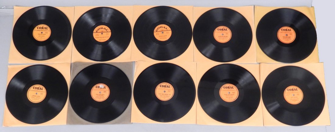 Lot of thirty 78 rpm's all Coral or M-G-M labels: Lot of thirty 78 rpm's, seventeen on Coral label, thirteen on M-G-M label, various artists including Arthur Smith "Cracker Boogie", Ames Brothers "Candy Bar Boogie", etc