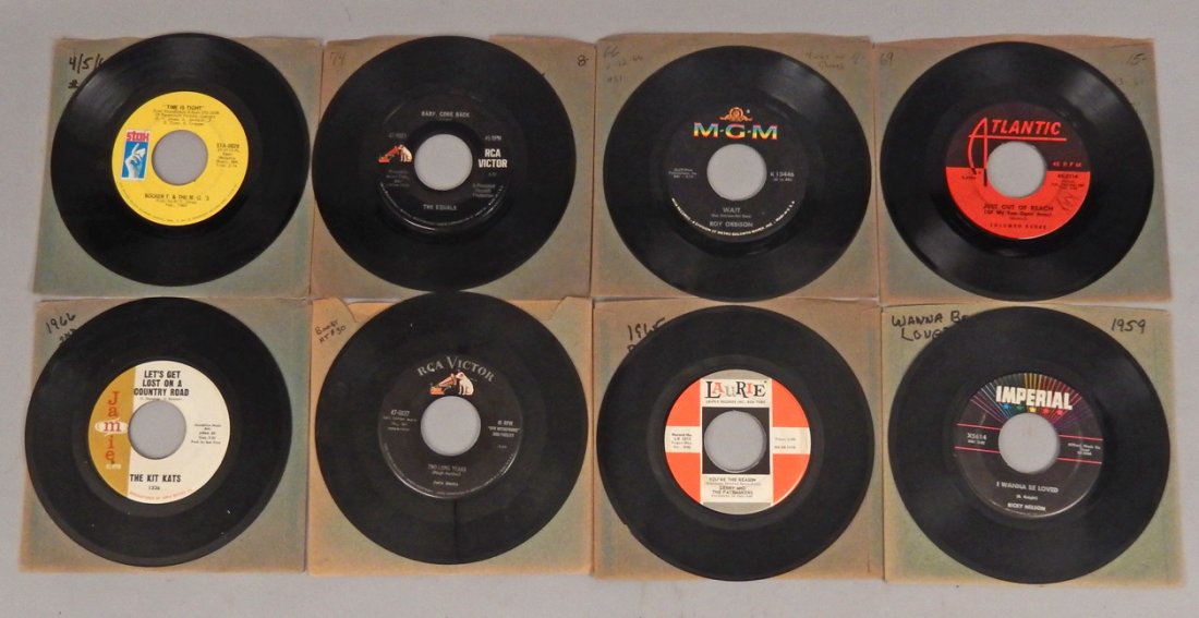 Eight 45 rpm's: Eight 45 rpm's including Ricky Nelson Imperial "I Wanna Be Loved", Gerry and The Pacemakers Laurie "Youâ€™re the Reason", Hugh Ashley RCA Victor "Two Long Years", The Kit Kats Jamie "Let's Get Lo