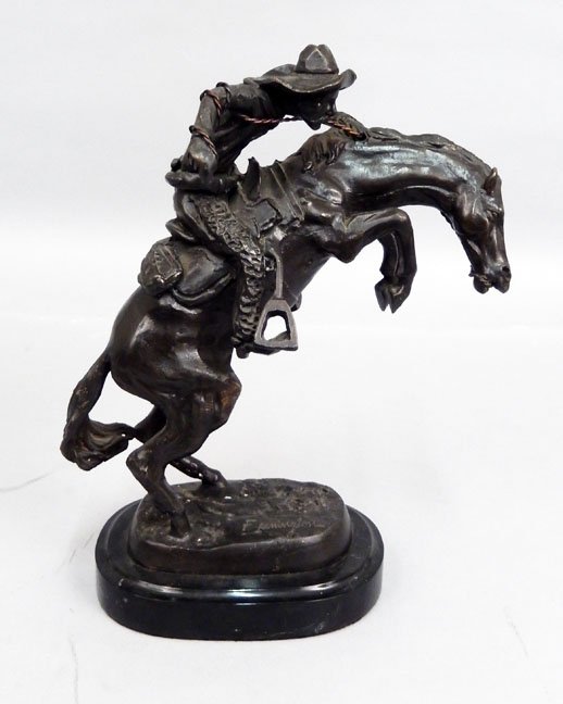 Frederic Remington bronze recast Bronco Buster: Frederic Remington bronze recast Bronco Buster, mounted on marble base, signed F. Remington, 10 1/2" high x 8" across, base is 3/4" high