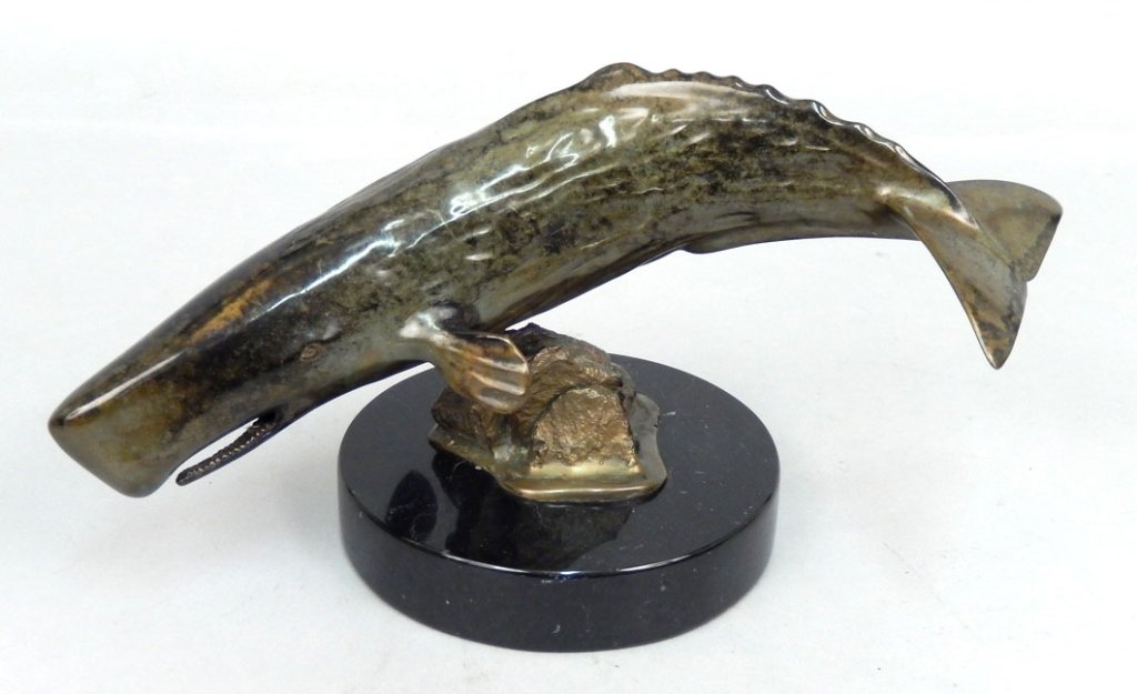 Randy Puckett bronze sculpture 1/60 scale Sperm Whale: Randy Puckett bronze sculpture 1/60 scale Sperm Whale, mounted on marble base, artist signed on back "Randy Puckett, 79/250, copyright 1983", 6" high x 11" wide x 5" deep