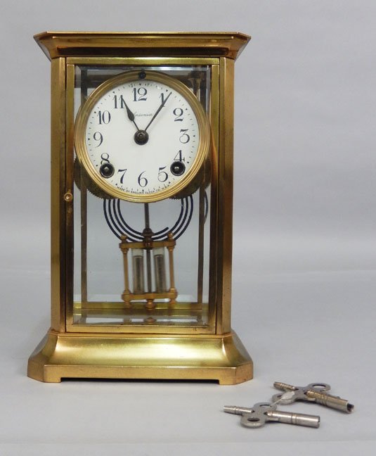 Ansonia brass desk clock: Ansonia brass desk clock, beveled glass, mercury glass pendulum, with key, 8 7/8" high