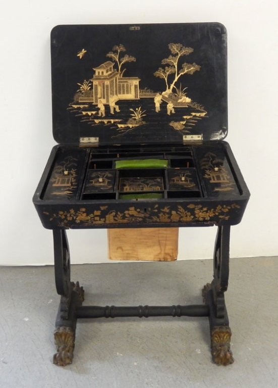Chinoiserie sewing stand: Chinoiserie sewing stand, hinged lid opens to expose interior compartments with lids and pin cushions, tray underneath slides out for scraps, harp supports on sides, gilt wood paw feet, center stretch