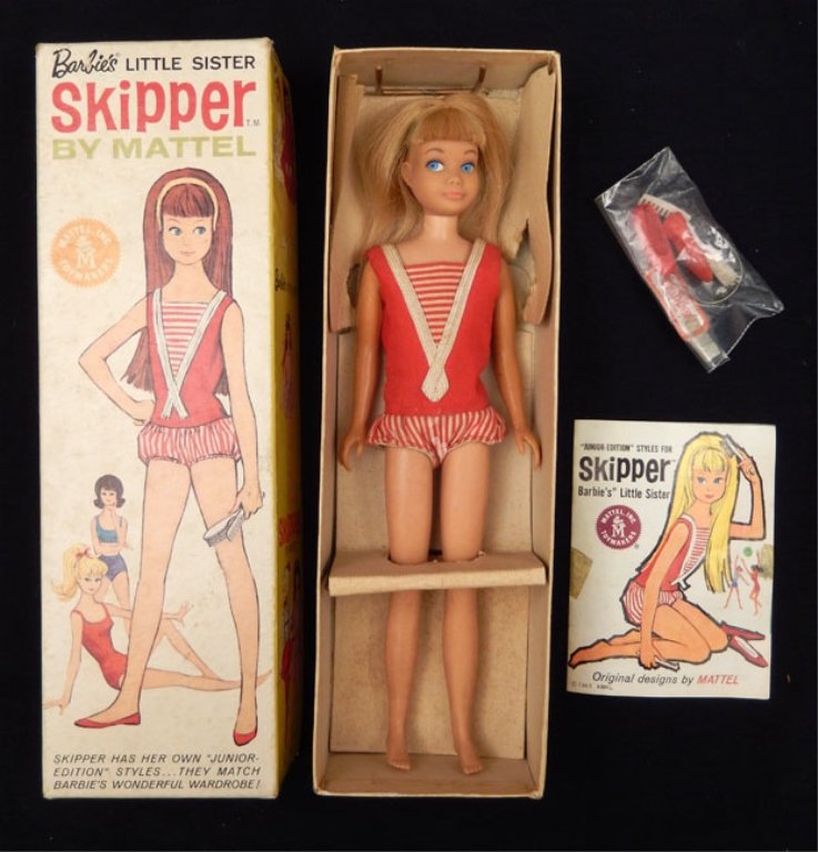 1963 Skipper doll in original box: 1963 Skipper doll in original box, with headband, shoes, brush, comb, booklet, and foil wrist tag, wearing red and white outfit, box measures 9 3/4" x 3 1/4" x 1 7/8"
