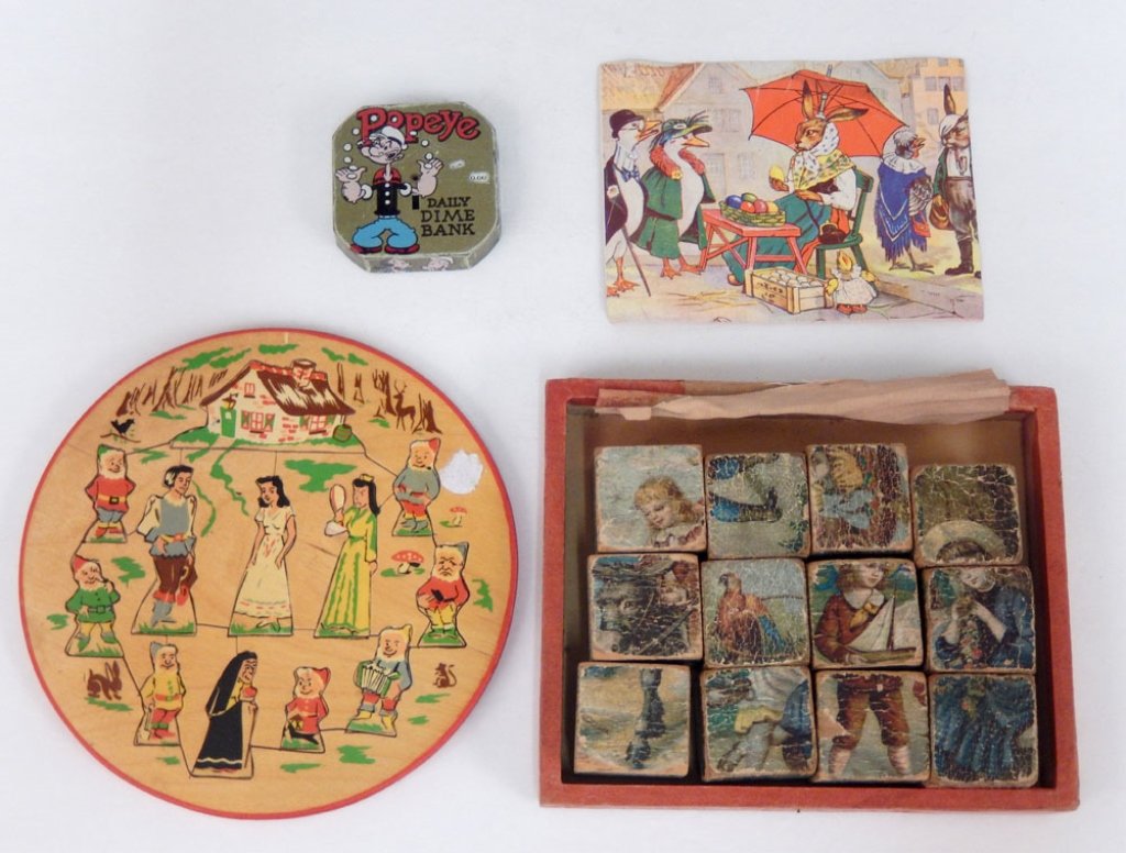 Popeye bank and two child's puzzles: Popeye bank and two child's puzzles, Popeye Daily Dime Bank, Snow White wooden puzzle, Made in Holland, and wooden block puzzles