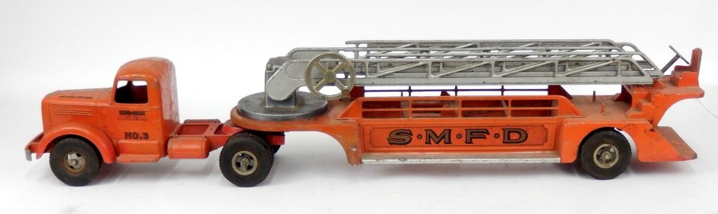 Smith Miller No. 3 aerial fire ladder truck: Smith Miller No. 3 aerial fire ladder truck, pressed steel, with decals, needs restoration, 36" long, Collection of John Dieterly