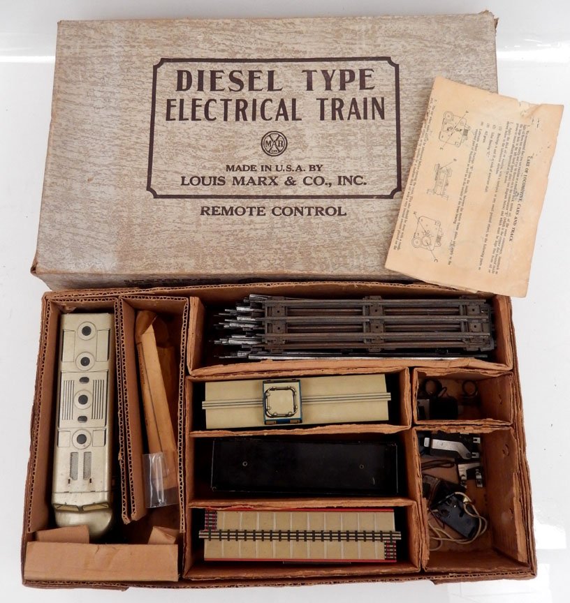Marx Diesel Type Electric Train Set in original box,: Marx Diesel Type Electric Train Set in original box, No. 9554, tin litho, includes Baltimore & Ohio engine, Wabash gondola, PRR Merchandise Service box car, and C517 Baltimore & Ohio caboose, four pie