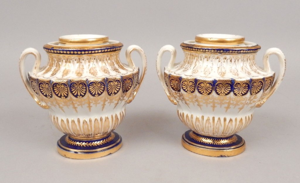 Pair of English 19th C. porcelain potpourri or rose: Pair of English 19th C. porcelain potpourri or rose jars, unmarked, possibly Worchester, fluted sides, double handled, removable inserts in bobeche form with pierced holes in neck, vales decorated in 