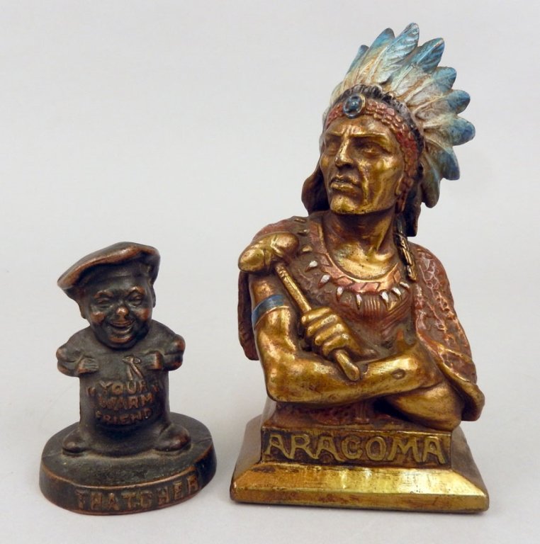 Two figural advertising paperweights (1 of 2)