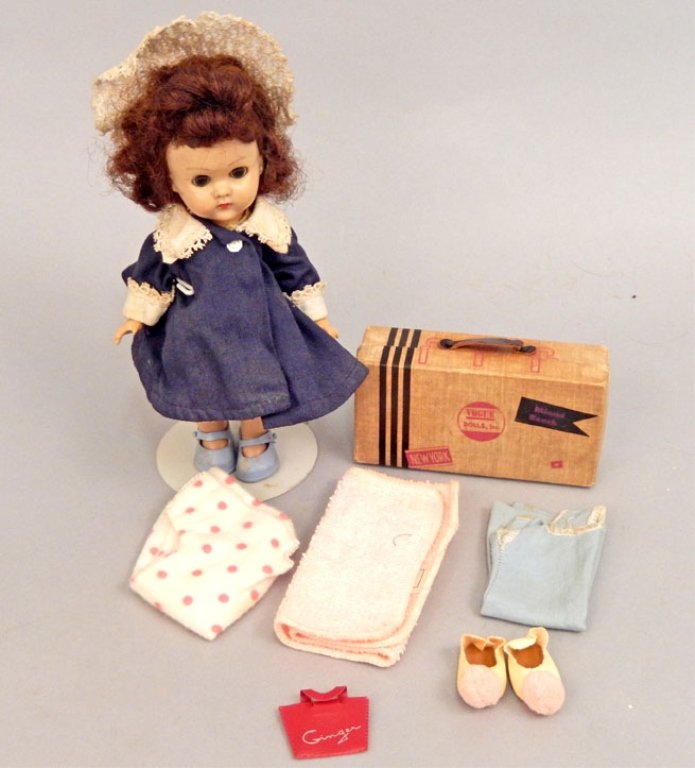Vogue Ginny bent knee walker and travel case: Vogue Ginny bent knee walker and travel case, 8" hard plastic Ginny, wearing yellow dress, underwear, hat, and tagged jacket, and vogue travel suitcase, with slippers, blanket, towel, dress and purse 