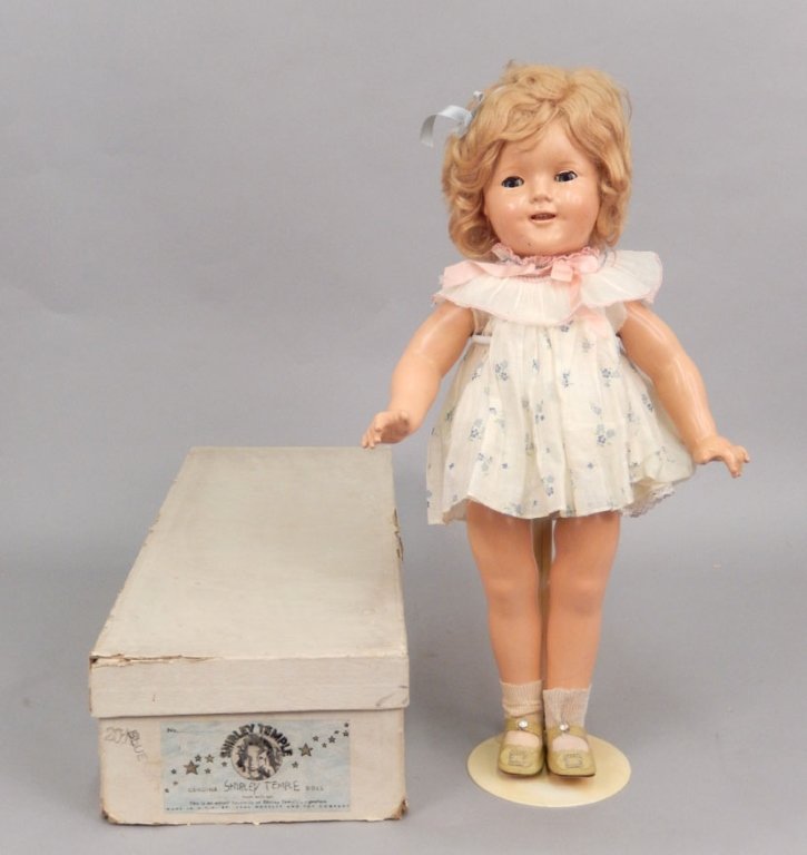 1930's Ideal composition Shirley Temple in original box: 1930's Ideal composition Shirley Temple in original box, jointed body, blue sleep eyes, applied upper lashes, painted lower lashes and eyebrows, open mouth with upper teeth, marked on head and back, 1