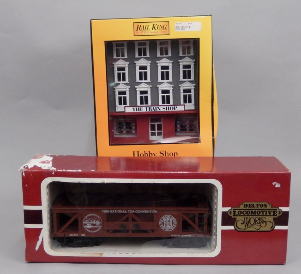 Rail King and Delton Locomotive Works: Rail King and Delton Locomotive Works, Rail King appears new in box, "The Train Shop", 13" x 10 1/2" x 10", and Delton 1988 National TCA Convention hopper in box, 7 1/2" x 20 1/2" x 5 1/4" Please be a