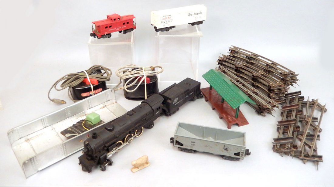American Flyer freight train set with track,: American Flyer freight train set with track, includes No. 287 steam locomotive and tender, No. 807 Rio Grande box car, No. 924 hopper, No. 938 caboose, No. 22004 transformer, No. 1 1/2 Toy Transformer