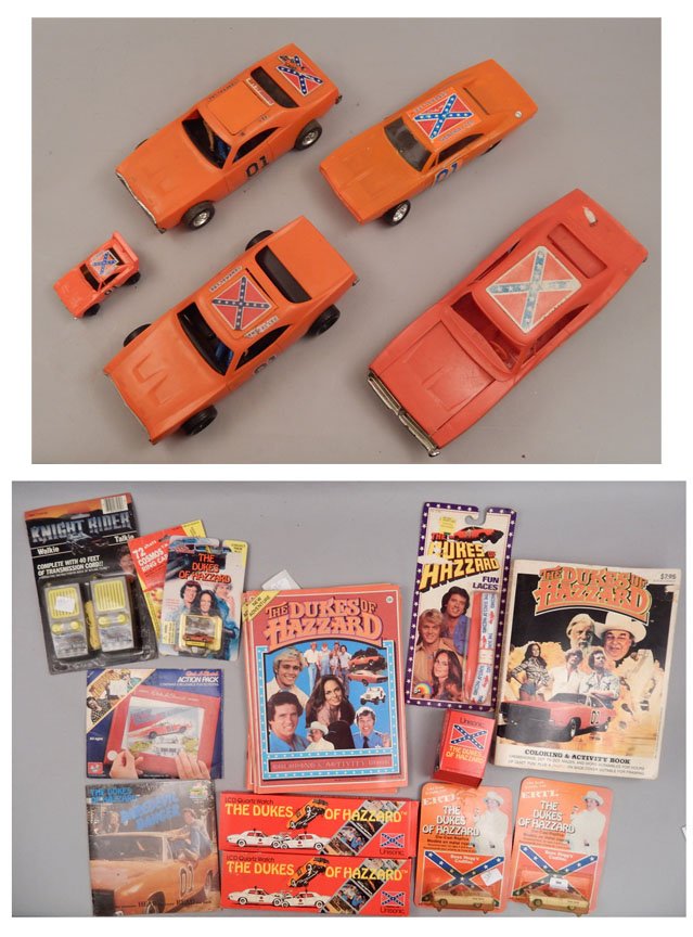 Grouping of Dukes of Hazzard memorabilia: Grouping of Dukes of Hazzard memorabilia, includes five cars, two Ertl Boss Hogg's Cadillac in packages, Racing Champions #144 General Lee collector car in package, Fun Laces in package, Etch a Sketch
