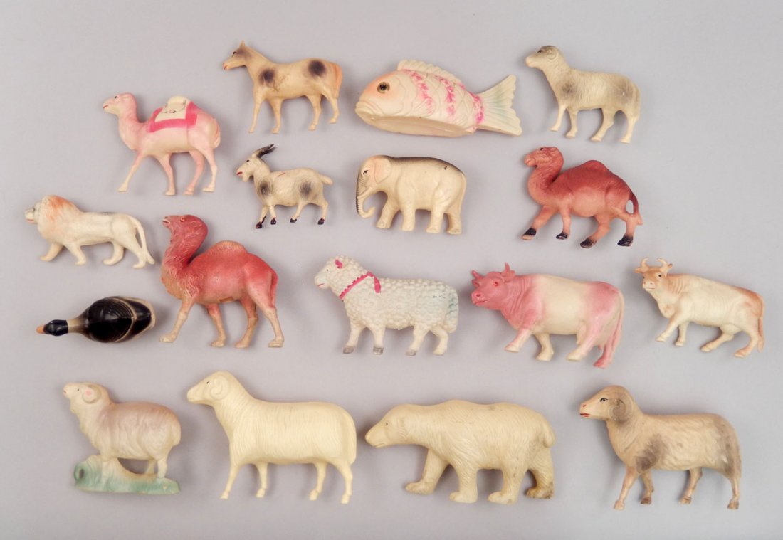 Grouping of celluloid animals, seventeen total,: Grouping of celluloid animals, seventeen total, includes farm animals, as well as polar bear, camel, fish, lion and camels, some marked Japan, some unmarked, 6 1/2" long and smallerPlease be aware of 