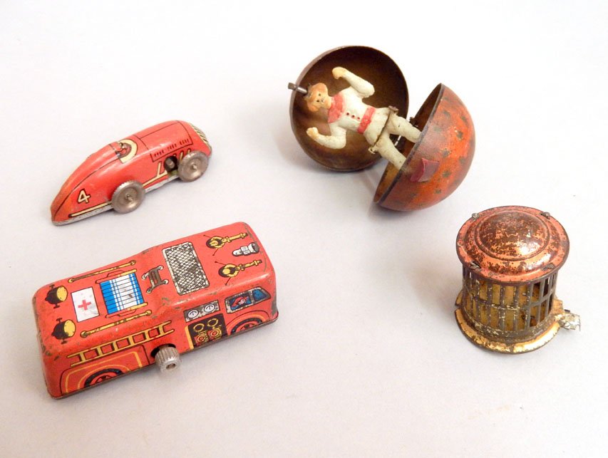Lot of four tin litho toys, includes friction race car (1 of 5)