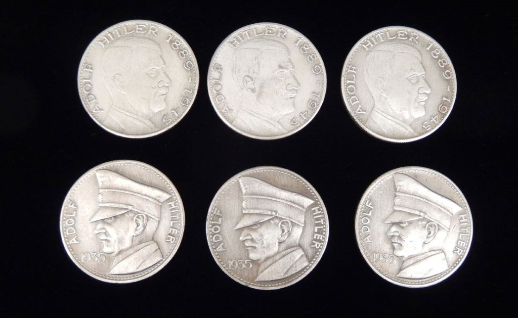 Six German medallions of Adolf Hitler: Six German medallions of Adolf Hitler, three are Adolf Hilter 1935 5 RM, and three are Adolf Hitler 1889-1945 Ein Volk Ein Reich Ein Fuhrer, replicas