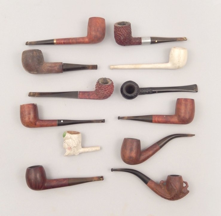 Twelve European wooden pipes: Twelve European wooden pipes, includes three Algerian Briar pipes, one with a 12kt band, Duke of Kent and Golden Sunset, one Old England, one Genuine French Briar of a claw holding the bowl, Long Cham