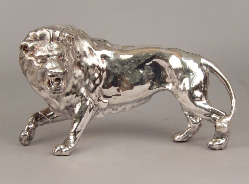 Sterling lion figure (1 of 3)