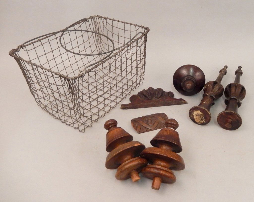 Wooden finials in wire basket (1 of 4)