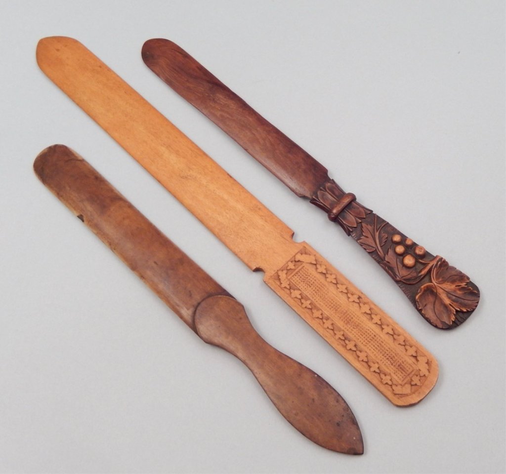 Three carved wooden page turners/cutters (1 of 2)