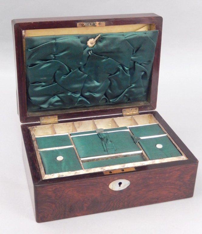 Mahogany and inlaid mother of pearl sewing box: Mahogany and inlaid mother of pearl sewing box, inlaid lid and escutcheon on front, inserted tray with green silk, 4 1/4" x 10" x 7"