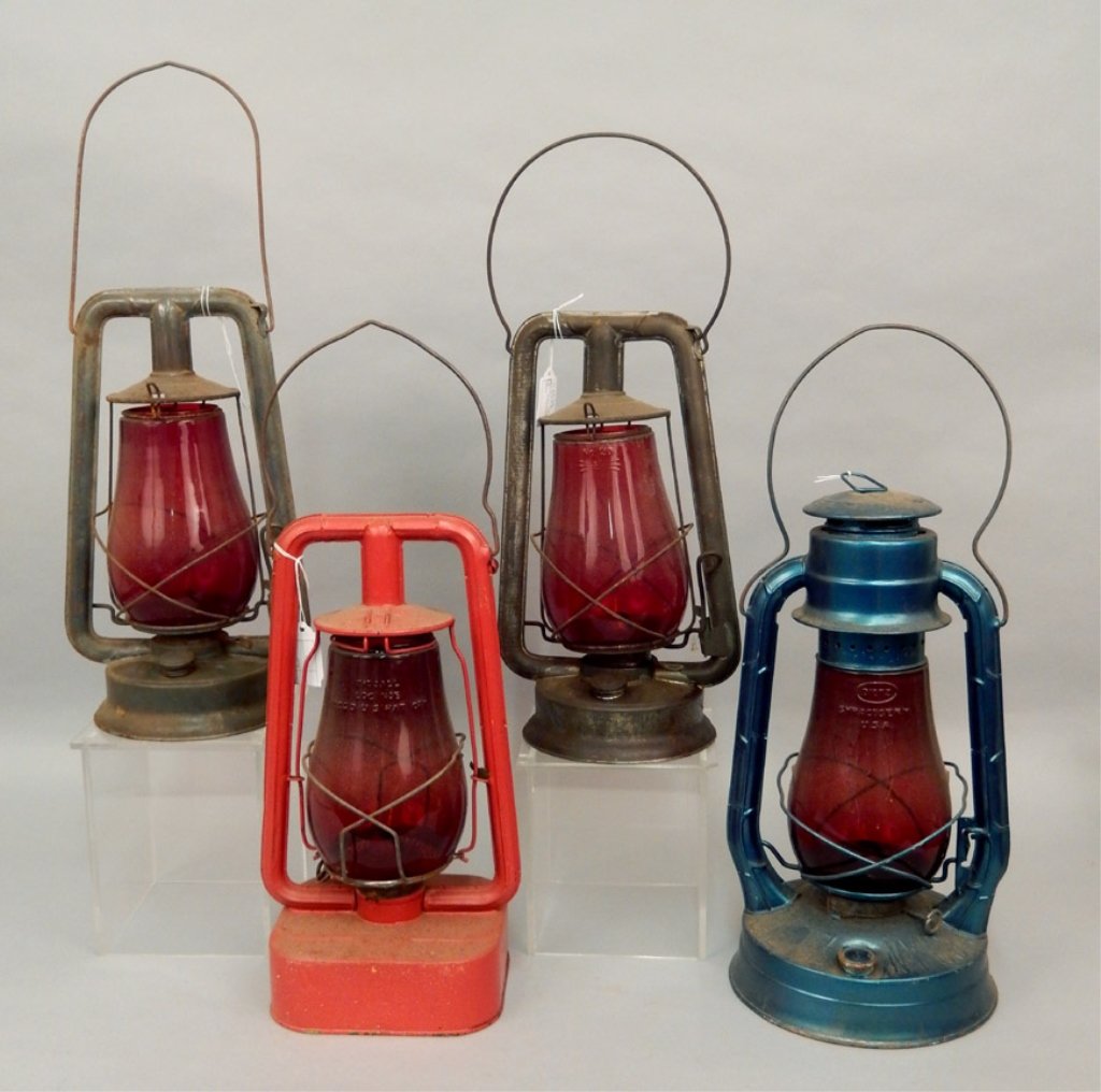 Four Dietz Lanterns: Four Dietz Lanterns, includes No. 0 Defiance and No. 210 Serreme, both painted grey and marked "N.J.S.H.D.", 13 1/4" x 7 3/4", No. 2 Blizzard, painted blue, marked "Con. Gas Elec. LT. & PR. Co. Baltim